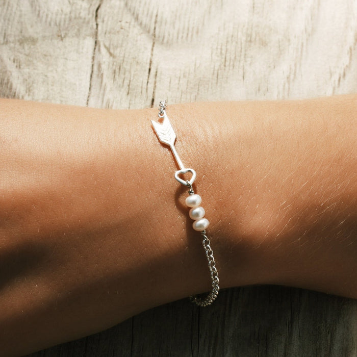 dainty silver chain bracelet with arrow design and silver detail