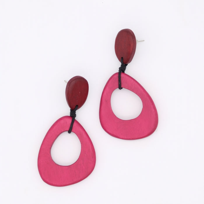 Pair of pink and red earrings on a white background