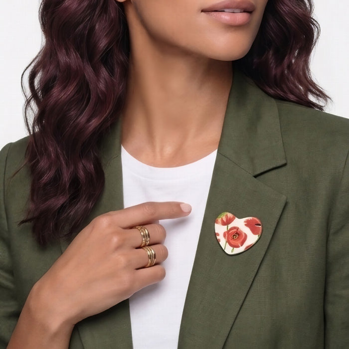 Woman wearing a heart shaped brooch