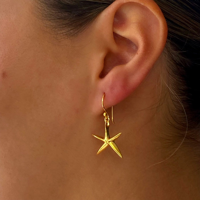 gold starfish earrings
