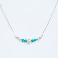 Sea Dreams pearl necklace with blue apatite gemstones and freshwater pearls in sterling silver