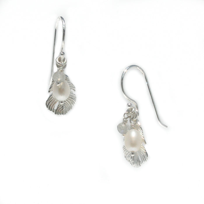 A pair of sterling silver pearl earrings with labradorite details, designed to resemble seashells.