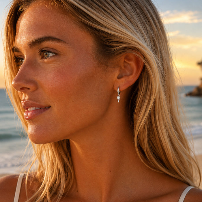 sea sparkle pearl huggie earrings designed in broome
