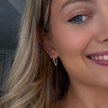 Gold loop earrings with freshwater pearls designed in Broome Western Australia