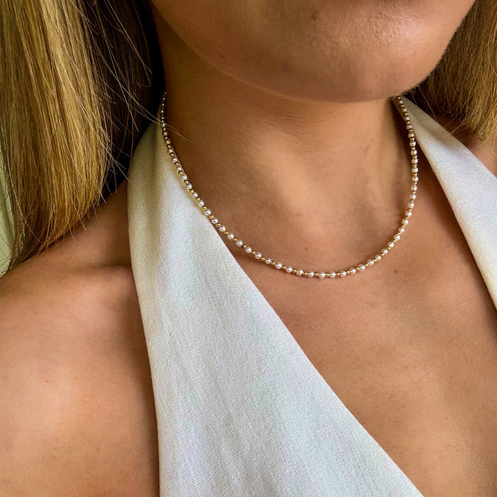 Sea Spray Pearl Necklace Gold crafted in premium gold vermeil over sterling silver featuring genuine freshwater pearls on a delicate chain.