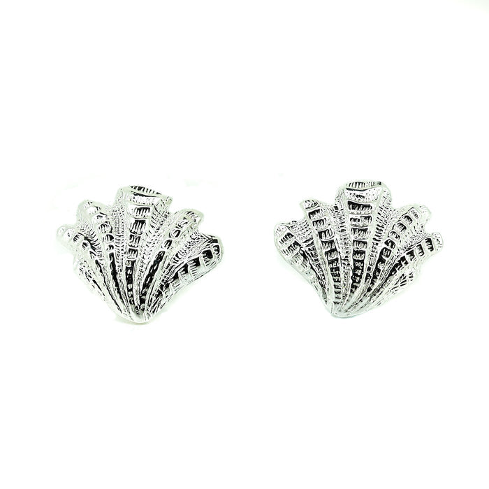 Bold sterling silver shell stud earrings with detailed textured coastal shell design inspired by European summer beach jewellery.
