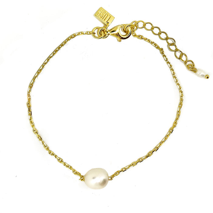 gold bracelet with dainty pearl
