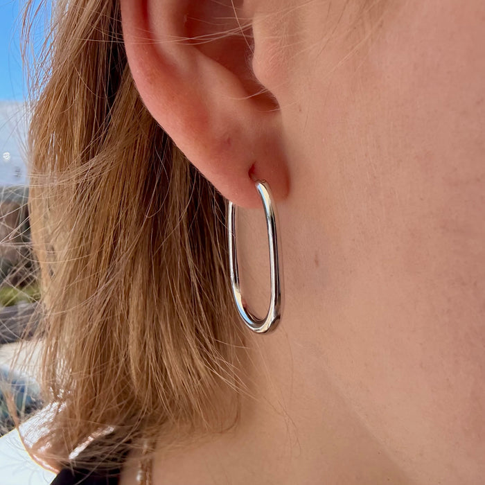 Sterling silver oval hoop earrings with a beachy coastal design, Australian jewellery designed in Broome