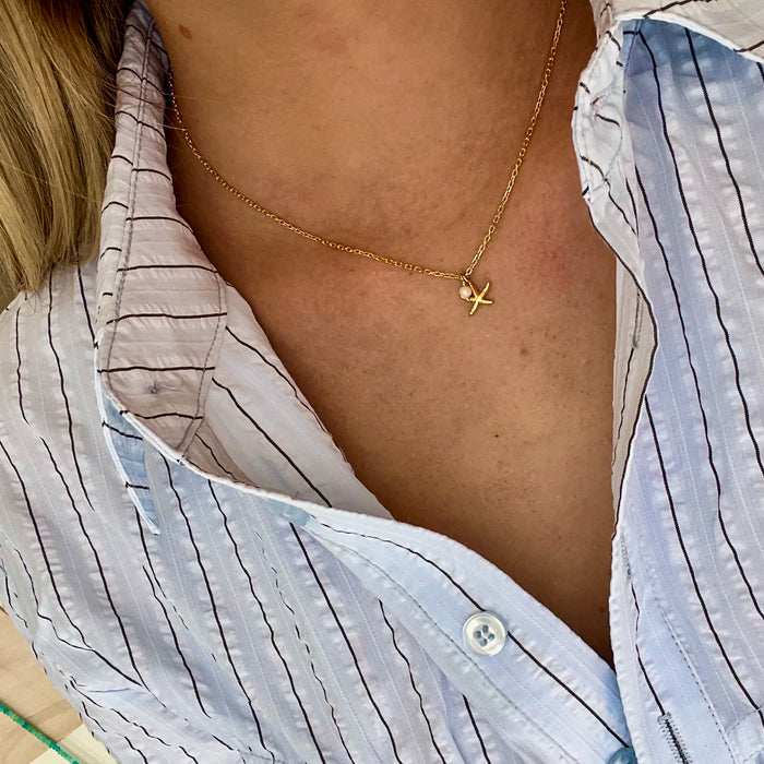 dainty gold starfish necklace