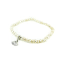 dainty seed pearl bracelet with silver shell charm