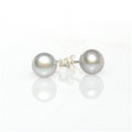 A pair of silver freshwater silver pearl 8mm stud earrings