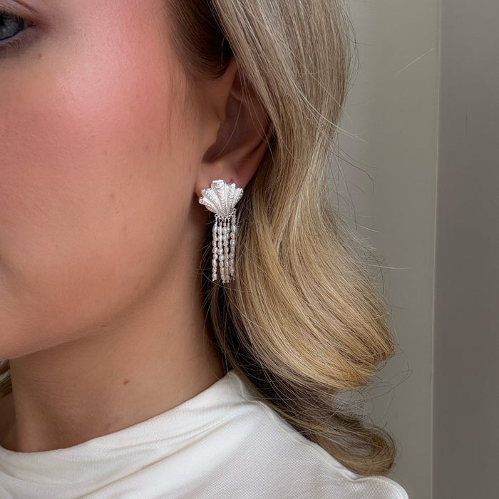 Golden shell cascade pearl earrings worn with freshwater pearl strands and gold vermeil shell stud Australian jewellery