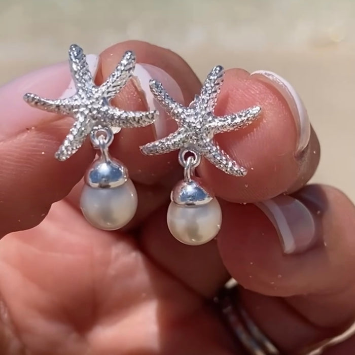starfish pearl studs with a freshwater pearl attached dangling underneath