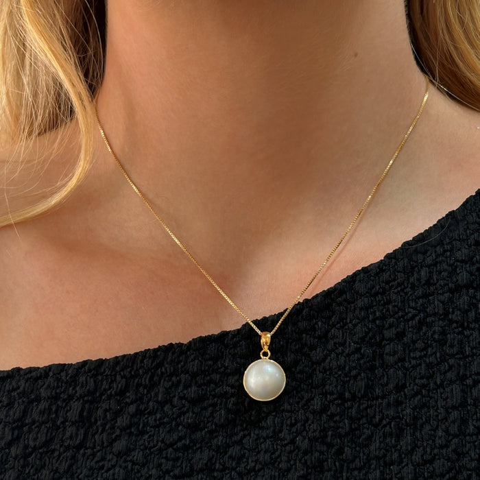 round mabe pendant set in gold vermeil
