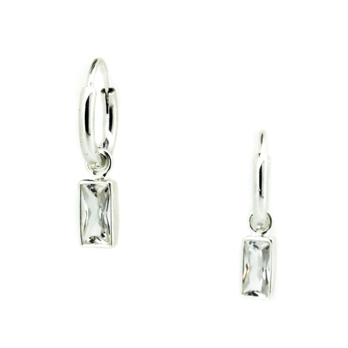 A pair of silver sleeper earrings with sparkling stones attached to hoop closures.