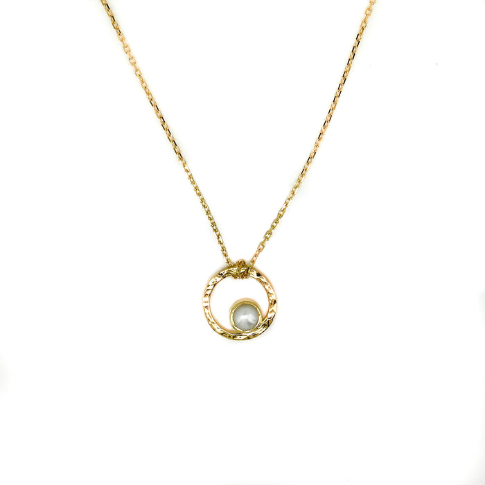 “Sunset Swirls gold vermeil necklace with freshwater pearl designed in Broome Western Australia”