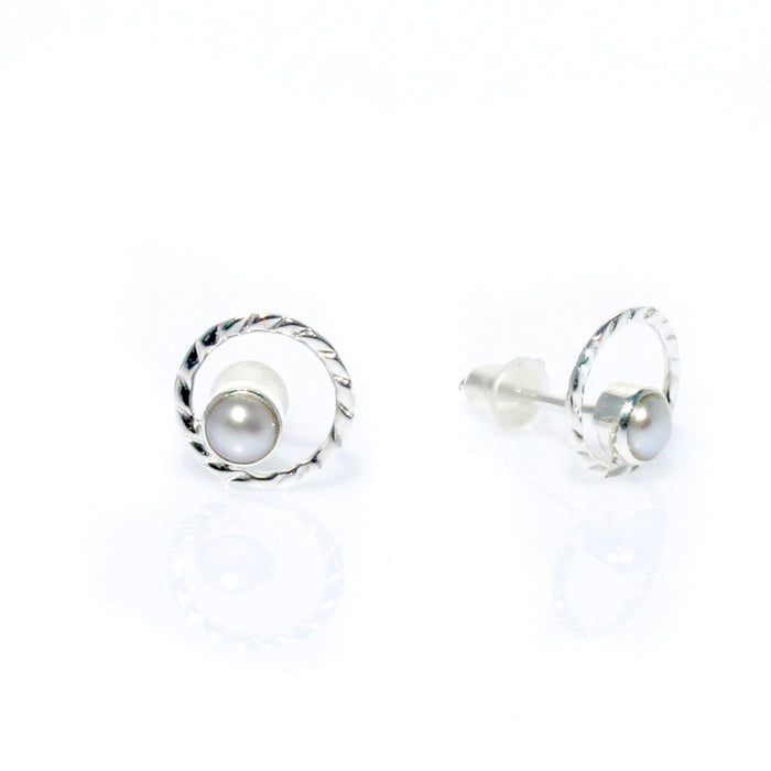 Dainty pearl studs with swirl detailing