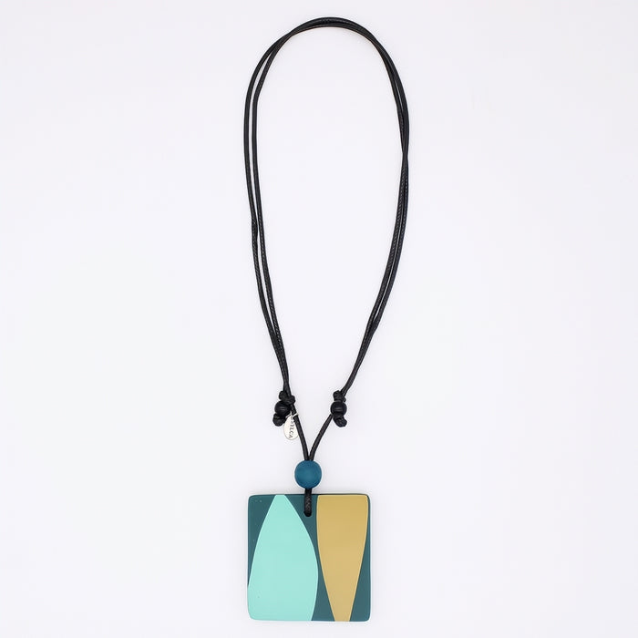 Necklace with a square pendant featuring a blue and beige design on a white background