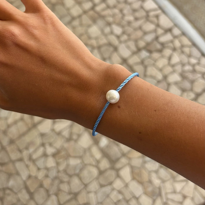 freshwater pearl bracelet on blue braid
