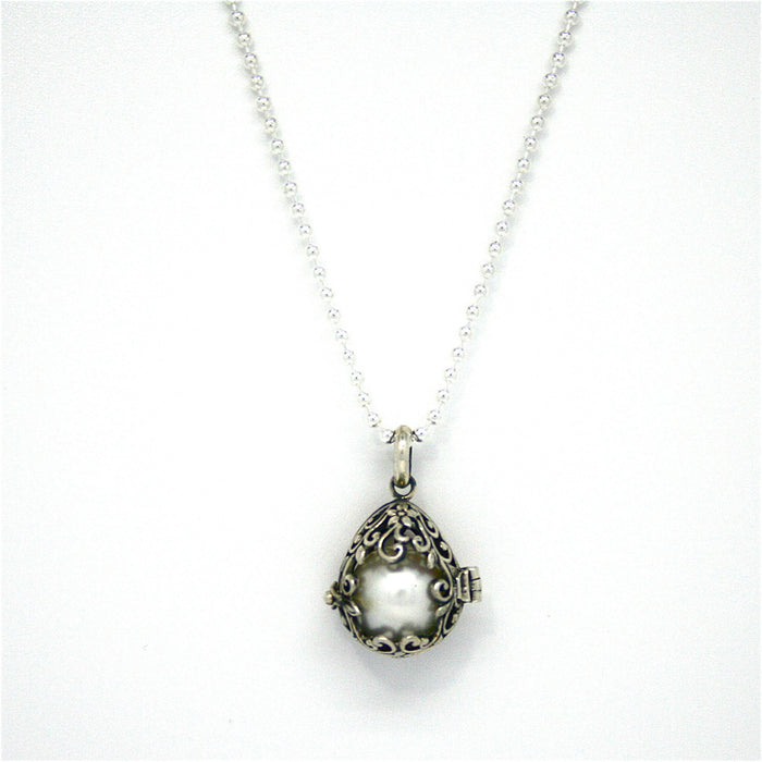 Tropical Embrace Pearl Pendant Oxide