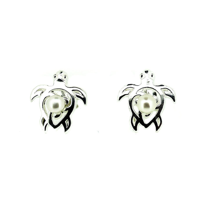 Pair of turtle-shaped earrings with pearl centers on a white background