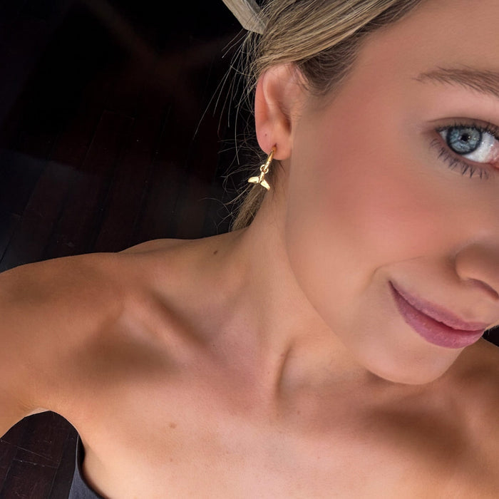 Whale tail huggies gold ocean inspired earrings designed in Broome Western Australia