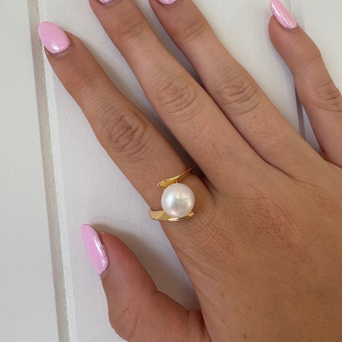 Whirlpool Pearl Ring Gold featuring a genuine freshwater pearl set in a swirling gold vermeil design over 925 sterling silver