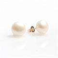 pearl studs in gold