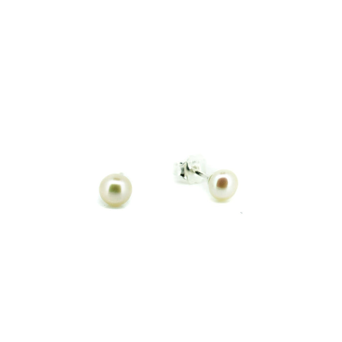 Pair of pearl earrings on a white background