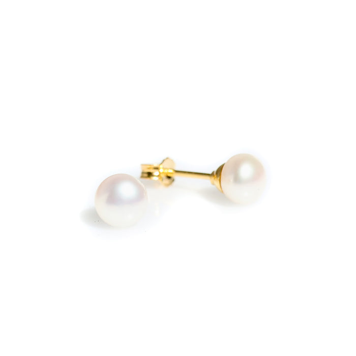 6mm dainty white pearl studs set in gold