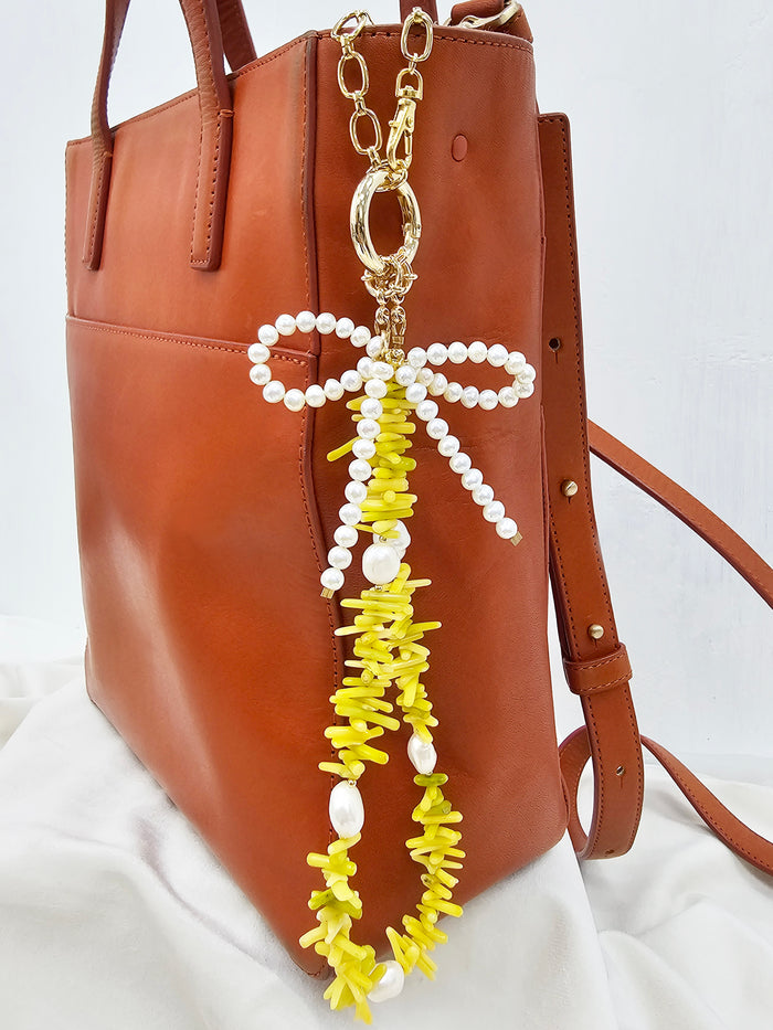 Yellow Bamboo Coral With Bowknot Freshwater Pearl Bag Charm