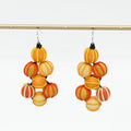 Pair of colorful stacked sphere earrings on a white background