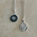 sterling silver necklaces with zodiac sign pendant, double sided one showcasing the Cancer symbol and the other with a dainty chain design, both on sterling silver pendant